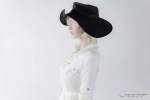 I immediately snapped the shutter once model Noel VanBrocklin twisted the black hat in this profile studio shot featuring a white silk top