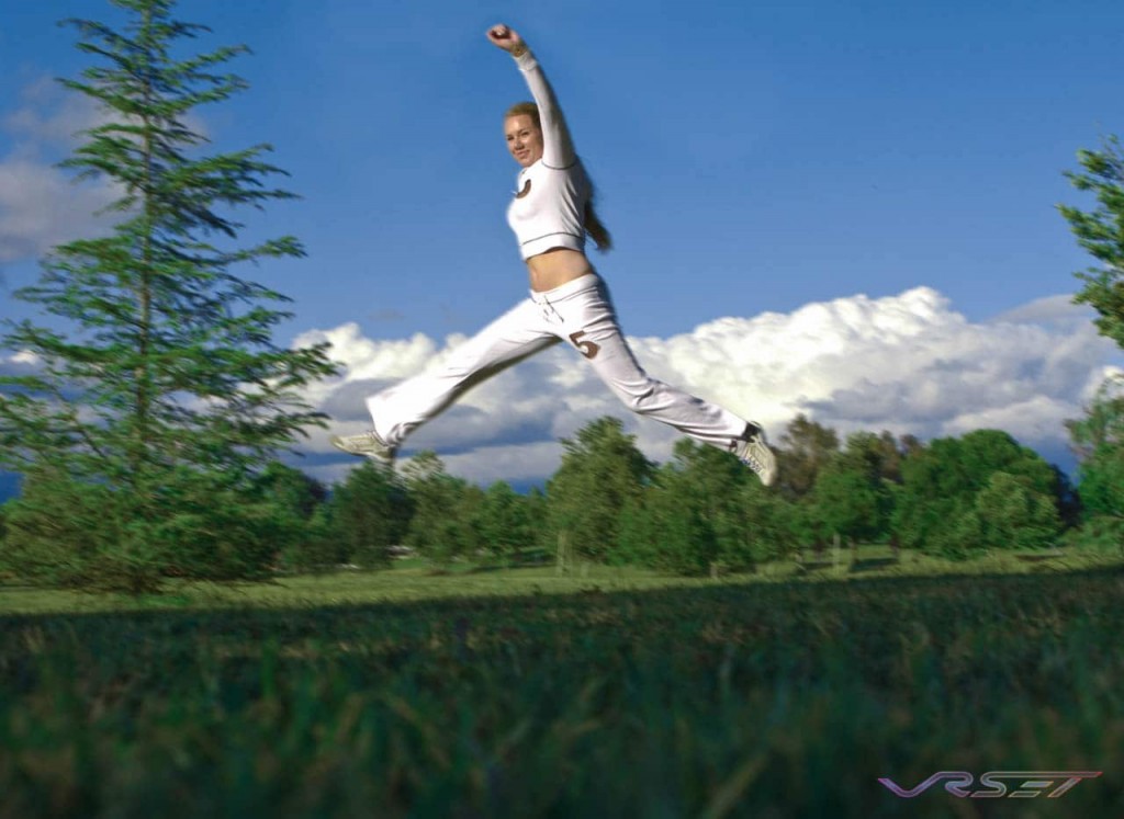 woman leaping in park