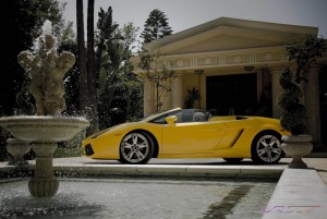 The Italian villa and the classic water fountain balance the 10 cylinder yellow Lamborghini Gallardo convertible just so perfectly in this print ad photo. Advertising photographer in L.A.