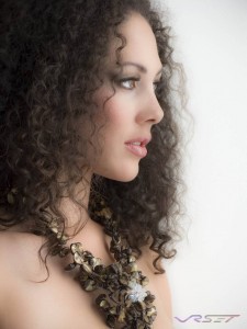 profile headshot model medium curly hair