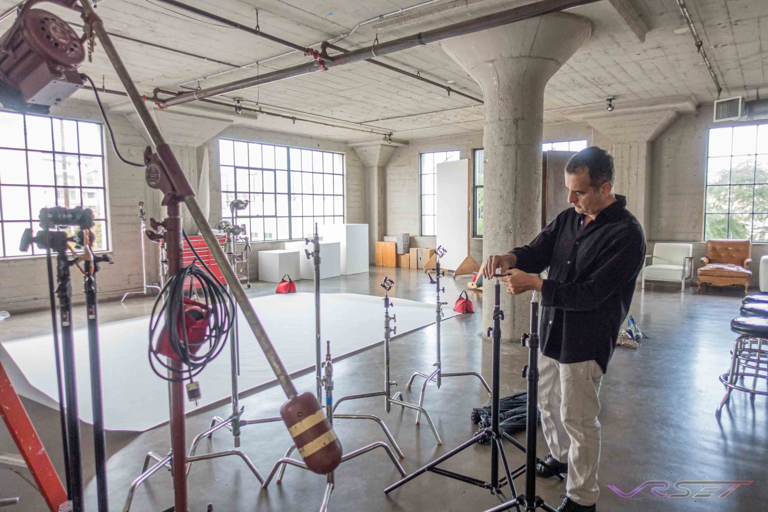 Fashion Photographer David Victory Setting Up Lighting At An La Clothing Photography Studio Fashion Photographer David Victory Setting Up Lighting At An La Clothing Photography Studio